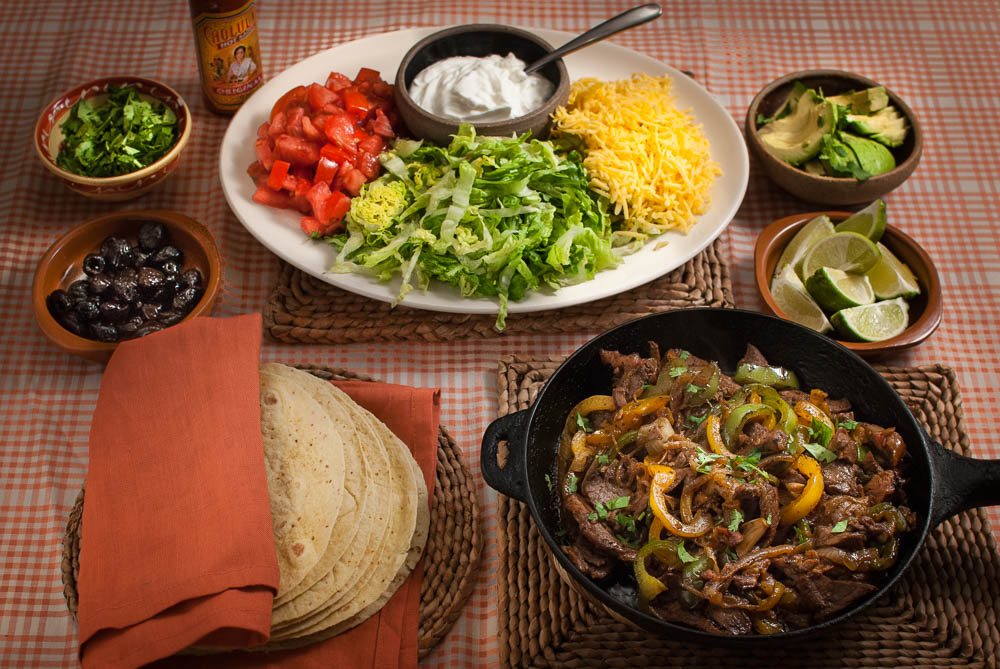 'We've been eating Mexican food for as long as I can remember. This simple fajita meal is perfect for a family feast, kids birthday party or having your mates over for the big game...'