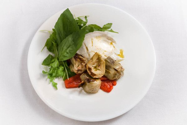 Through a process of trial and error - motivated as much by curiosity as thrift - I have finally devised a method to elevate the status of these bland buds to that of a proper chargrilled artichoke. 