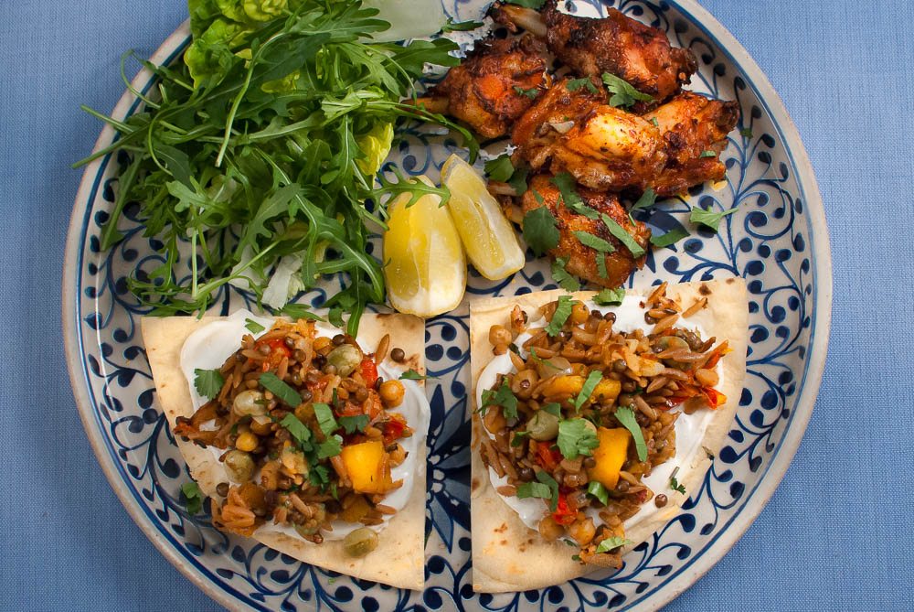 'My kinda' meal. Bread, chicken, yogurt, peas and pasta - all eaten with the hands. Seriously good food.'