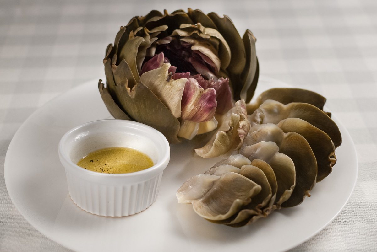 'These artichokes are a real treat! They taste amazing with a beautiful vinaigrette to dip the leaves in. But the best bit is yet to come!'