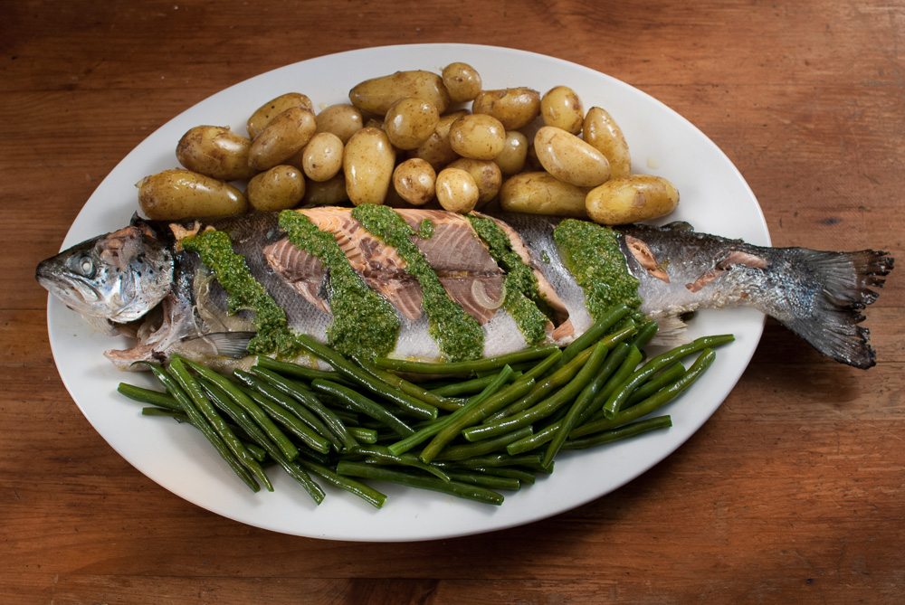 It’s a Friday and Darren Poulter, the fishmonger is plying his wares: 'Lovely wild sea bass today, beautiful Cornish mackerel, line caught cod....'