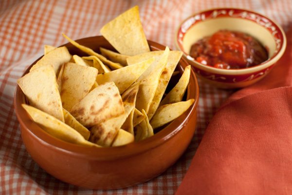 Brilliant trick for making tortilla chips from normal (UK) supermarket tortilla wraps. (You can't just fry them!)