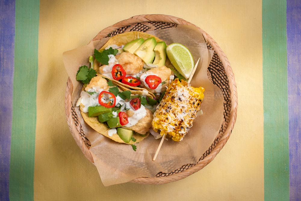 I've posted another recipe for fish taco using salmon. This versions has a developed sauce which is rather like a Mexican tartar sauce. I've also added street-style corn on the cob which is a perfect accompaniment.