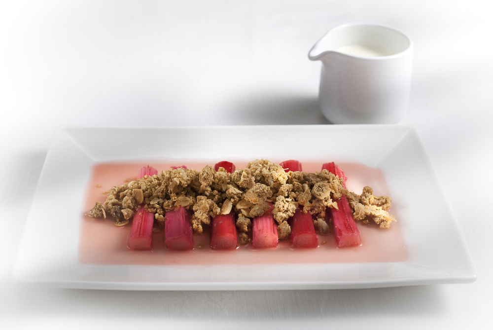 Rhubarb is brilliant - it's got a silly name, it's vegetable that tastes like fruit, and its pink! My 'deconstructed' crumble keeps the shape and the beautiful colour of the rhubarb and transforms a homely pud into a something special. 