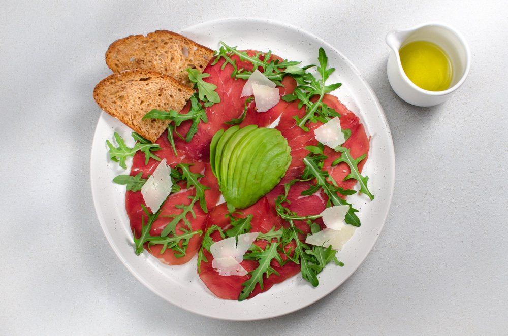 This is a standard Soho trattatoria fare of the 70's. Bresaola, rocket and Parmesan is still popular so the avocado element seems to have fallen out of favour. Put it back in - it's a good combo!