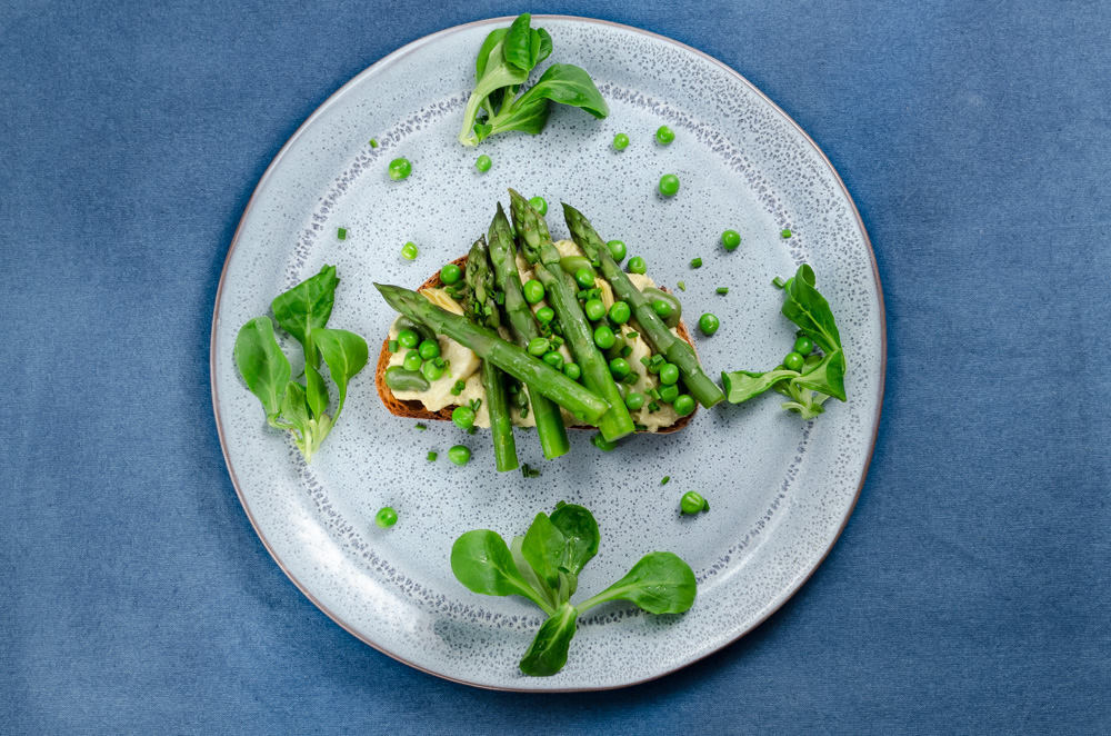 Most asparagus bruschetta recipes use goats cheese. I tried this and it's okay but unremarkable, so I made a artichoke and cannellini bean puree to replace the cheese - it's much better. 