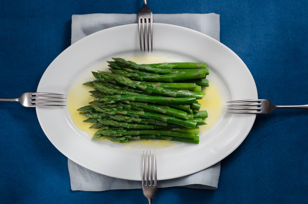 Most cooks agree that when you have an amazing ingredient it is best to prepare it as simply as possible. And they are not wrong: this must be the very best way to eat asparagus. Steamed and presented in a big stack to share. Butter, salt and lemon are optional extras... 