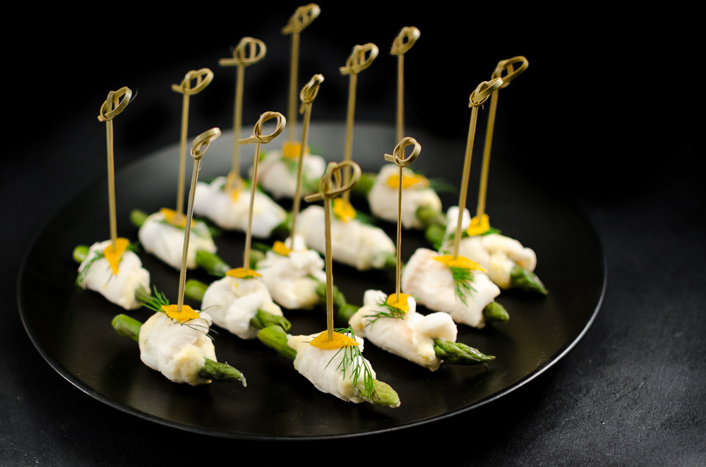 This is a spin on Escoffier's white asparagus with sauce maltaise. The two are often served as an accompaniment for a white fish such as turbot. Here the fish is plaice rolled around asparagus and a maltaise mousse and served as a canapé.